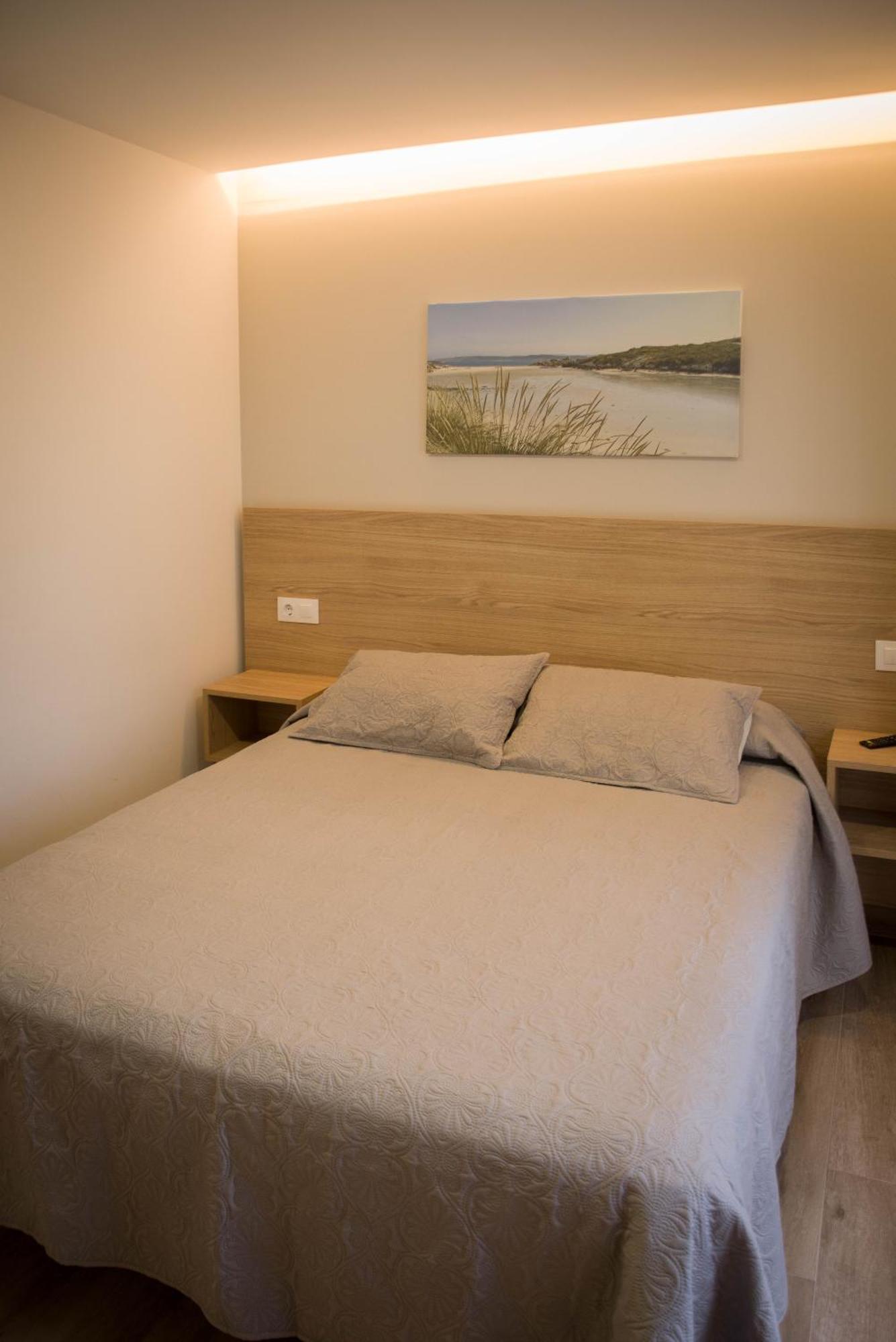 Apartamentos turisticos HAZ AMIGO Muxía Quarto foto