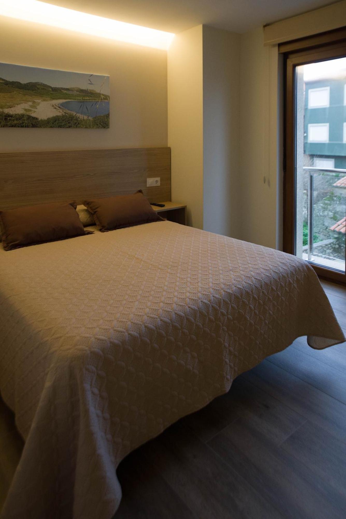 Apartamentos turisticos HAZ AMIGO Muxía Quarto foto
