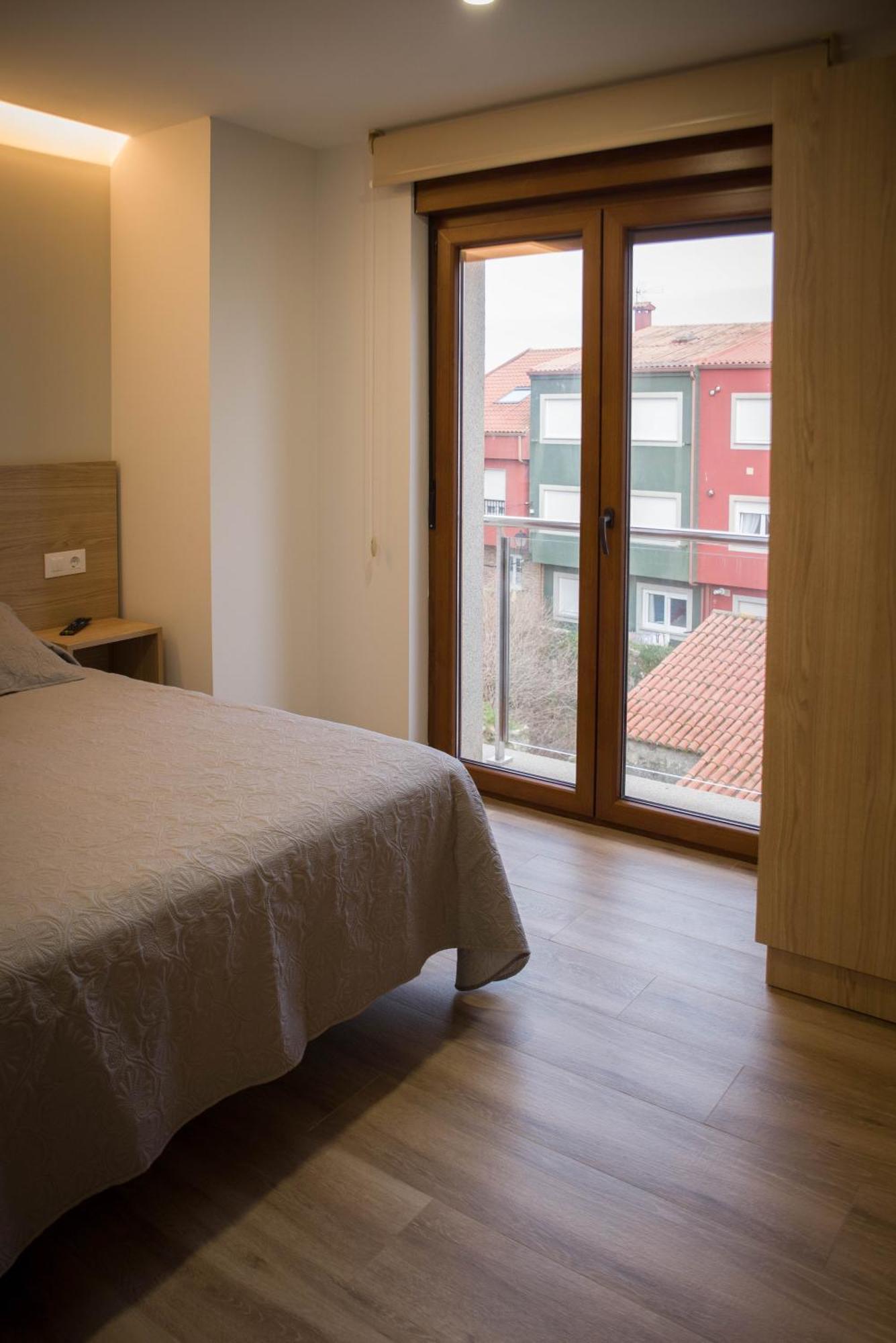 Apartamentos turisticos HAZ AMIGO Muxía Quarto foto