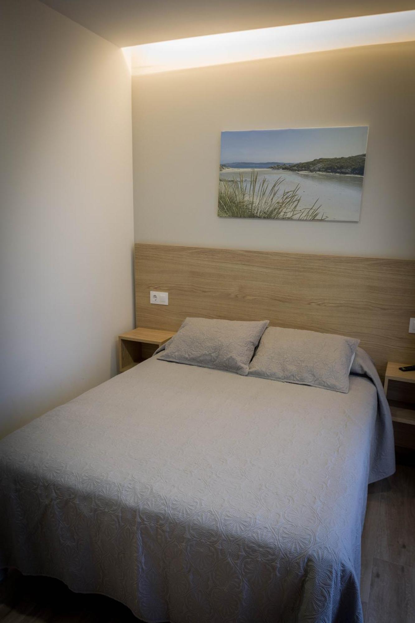 Apartamentos turisticos HAZ AMIGO Muxía Quarto foto